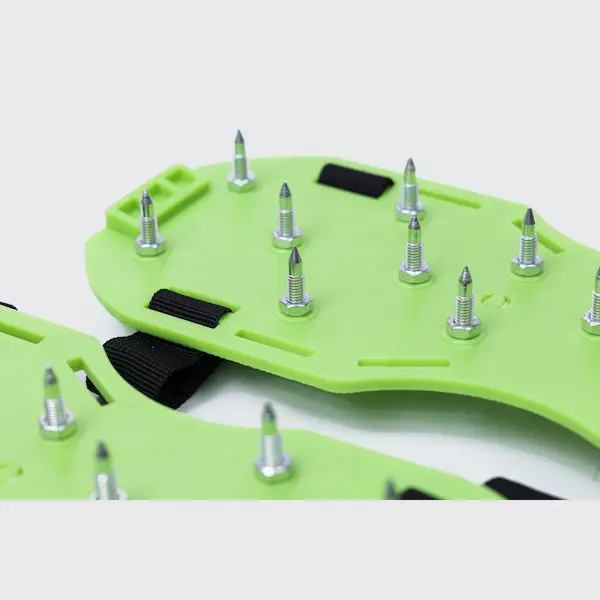 Adjustable Spike Shoes for Self Leveling Floor Construction