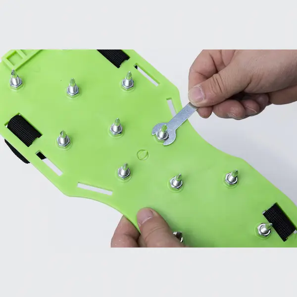 Adjustable Spike Shoes for Self Leveling Floor Construction